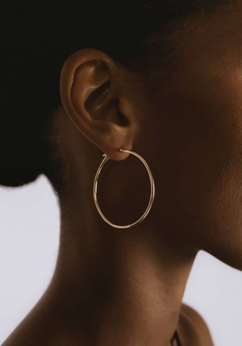 gold large-size siren hoop earrings by Washed Ashore